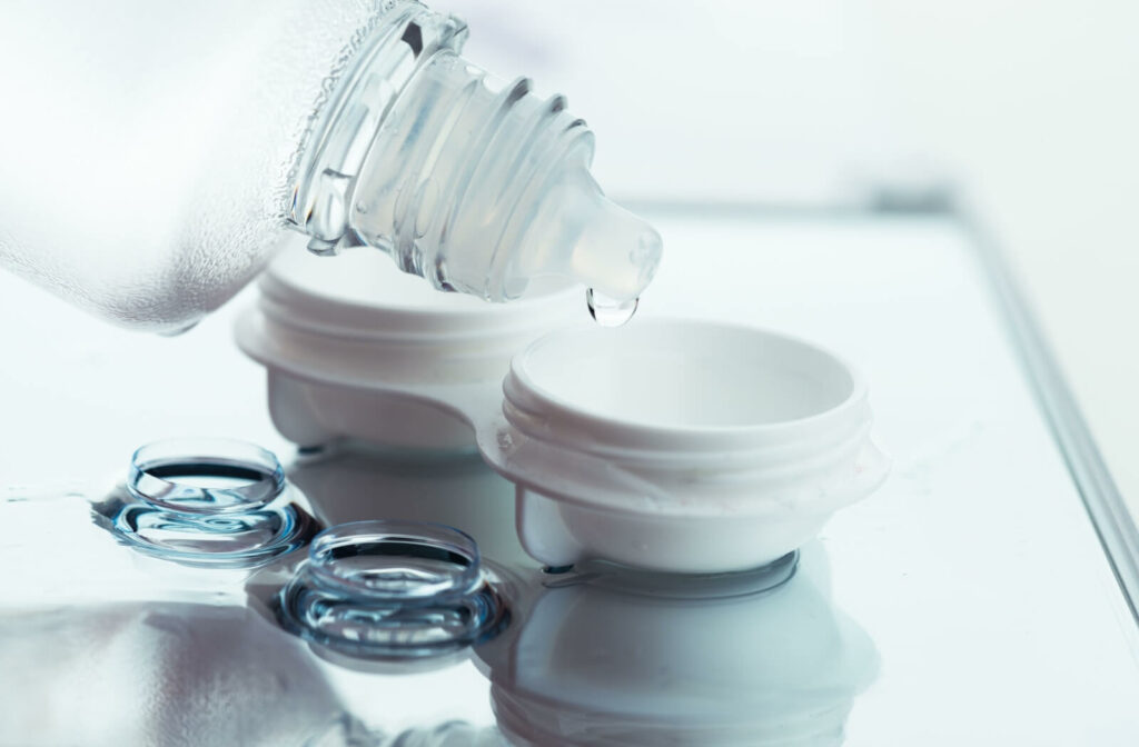 Contact lens solution being poured into a contact lens case.